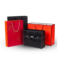 Sacs de shopping en papier d'art noir mat de luxe pour magasins de vêtements, avec logo personnalisé et impression de marque privée