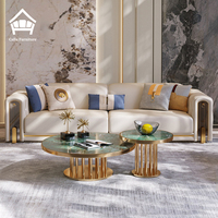 Ensemble de meubles de luxe pour salon de villa haut de gamme moderne, canapé en cuir véritable beige chaud à rayures dorées, table basse, table d'appoint