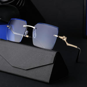 Gafas de sol con estampado de leopardo para hombre, montura metálica sin marco, UV400, antideslumbrantes, para conducir, gafas de protección solar a la moda, Color dorado - Product Image 1