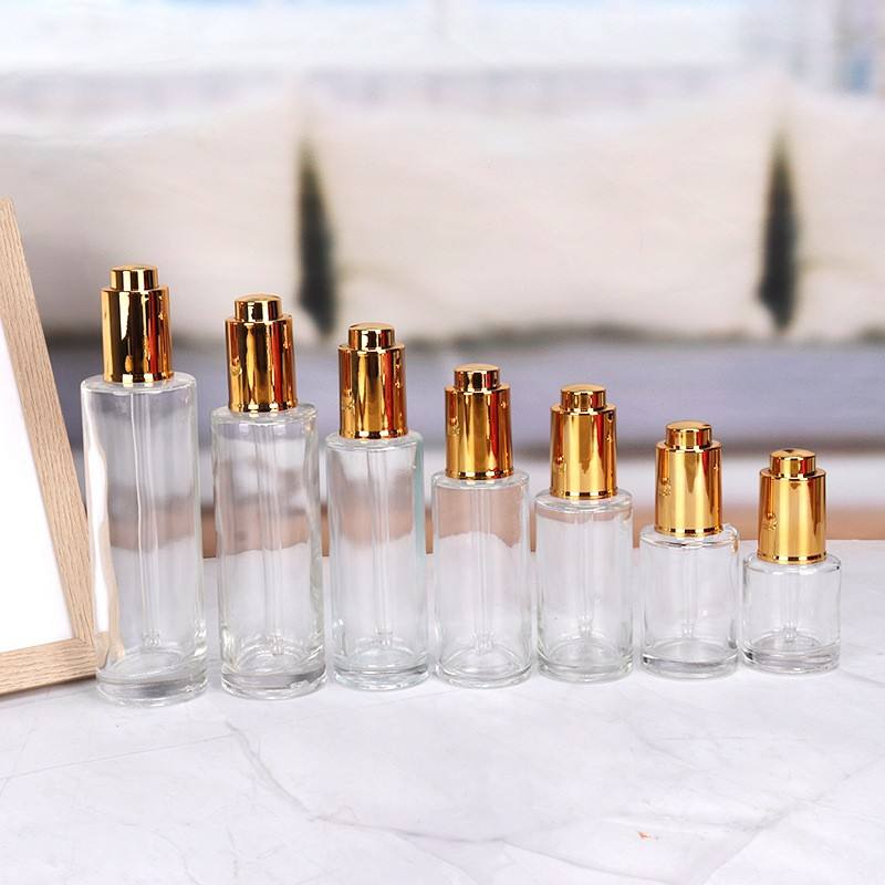 Clear bottle with gold top