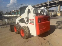Asli digunakan S185 selip Steer Loader roda Mini Backhoe dengan kondisi baik ember jam kerja rendah