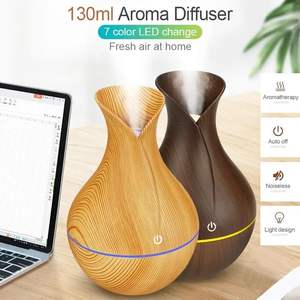 Mini humidificateur et diffuseur d'arômes USB 130 ml à grain de bois avec veilleuse ultra-silencieux pour la maison et l'hôtel - Vente en gros - Product Image 5