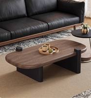 Table basse ovale en bois brun de style moderne pour salon et salle de séjour