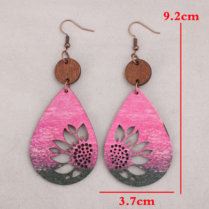 Pendientes colgantes vintage con forma de gota de girasol para mujer, joyería hueca de doble cara estilo madera - Product Image 4