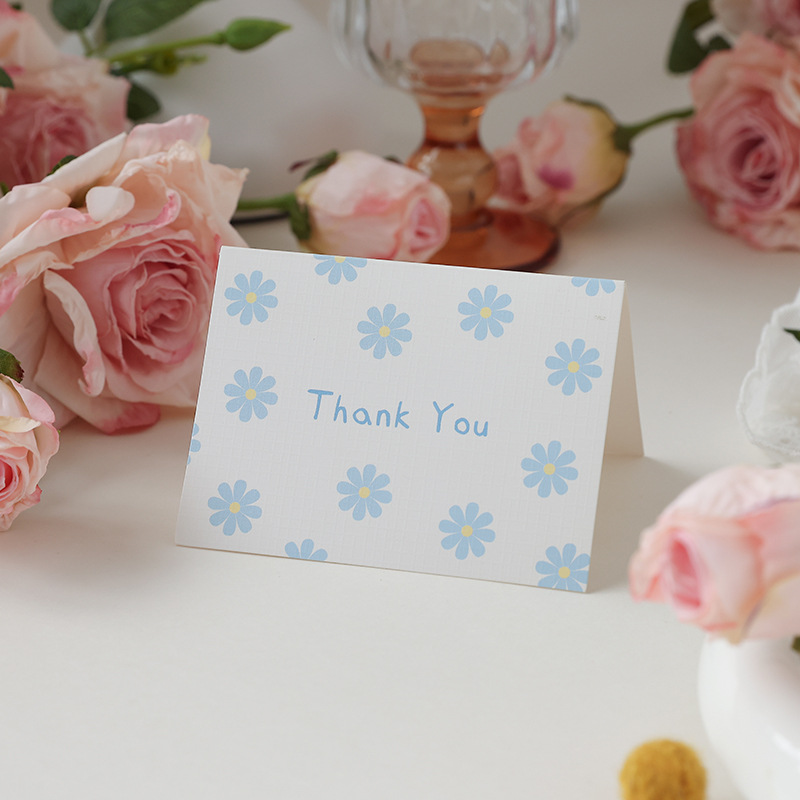 Merci (fleur bleue)
