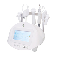 Appareil professionnel électrique de microcourant pour le visage, gants de microcourant EMS, masseur facial, machine Golden Finger