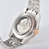 Montre mécanique automatique personnalisée en acier inoxydable bicolore or rose et argent, cadran à motif feuille de palmier, étanche 50 bars, cannelée