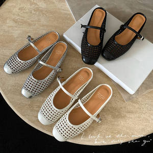 Sandalias planas de mujer con punta redonda y tejido hueco, estilo diadema a la moda - Product Image 1