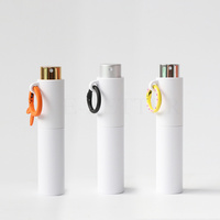 Nouveauté : Atomiseur de parfum 10 ml avec porte-clés, flacon pulvérisateur d'huile de parfum rechargeable, atomiseur à pression avec crochet