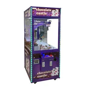 Venda quente mini brinquedo garra guindaste máquina kit chocolate doces garra jogo máquina