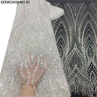 Nouveautés Tissu de dentelle perlée lourde de Dubaï Tissu de dentelle de mariée perlée de paillettes de broderie africaine