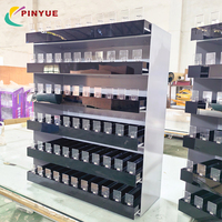 Vitrine à cigarettes sur pied moderne personnalisée avec cadre métallique, éclairage LED, hauteur réglable et poussoir automatique pour tabac