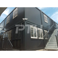 Maison conteneur modulaire préfabriquée en acier noir moderne à deux étages, la plus vendue, pour bureau de chantier