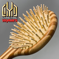Brosse à cheveux démêlante en bois de bambou Stripe Fashion avec coussin, facile à nettoyer, non jetable, noire, vente en gros, personnalisable