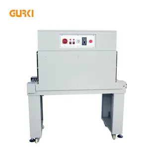 Máquina Automática de Envasado GURKI con Túnel de Calor para Termoencogimiento, Etiquetado y Envoltura de Botellas o Cajas Pequeñas - Product Image 1