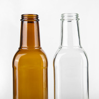 Bouteille en verre ronde transparente ambrée de 520 ml pour boissons, huile, vinaigrette, bière, avec logo personnalisé en gros