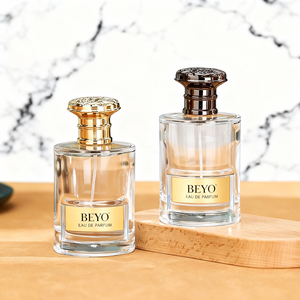 Botella de Perfume de vidrio de lujo de alta calidad de 100ml, Diseño de cilindro de cuello de crimpado transparente, bomba, tipo de sellado, pantalla de seda <span class=keywords><strong>BEYO</strong></span> XS394 - Product Image 1