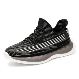 Chaussures de sport à surface filetée pour hommes adultes, décontractées, respirantes, en promotion, pour la course, printemps-été, confortables avec semelle massante - Product Image 1