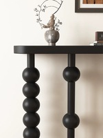 Table console noire moderne et courbée, table d'entrée étroite avec pieds en forme de bulle pour la décoration du salon à la maison