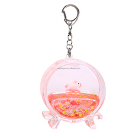 Porte-clés en acrylique avec flacon de parfum, OEM/ODM disponible, vente chaude en usine, design créatif, mignon, dessin animé avec paillettes et flotteur 3D à effet sable mouvant