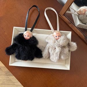 Colgante de muñeca de felpa con estampado de leopardo y cuero negro, accesorio de lujo para bolso <span class=keywords><strong>Kelly</strong></span>, llavero colgante de nicho para bolso - Product Image 1