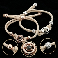 Parures de bijoux intelligentes pour couple, bracelets de projection, cadeau de Saint-Valentin, bracelet en verre rond pour couples, vente en gros