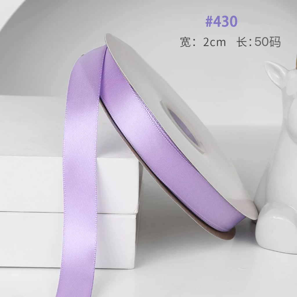 #ริบบิ้นโพลีเอสเตอร์สีม่วงอ่อน 430 ขนาด 2 ซม. ยาว 50 หลา - - -