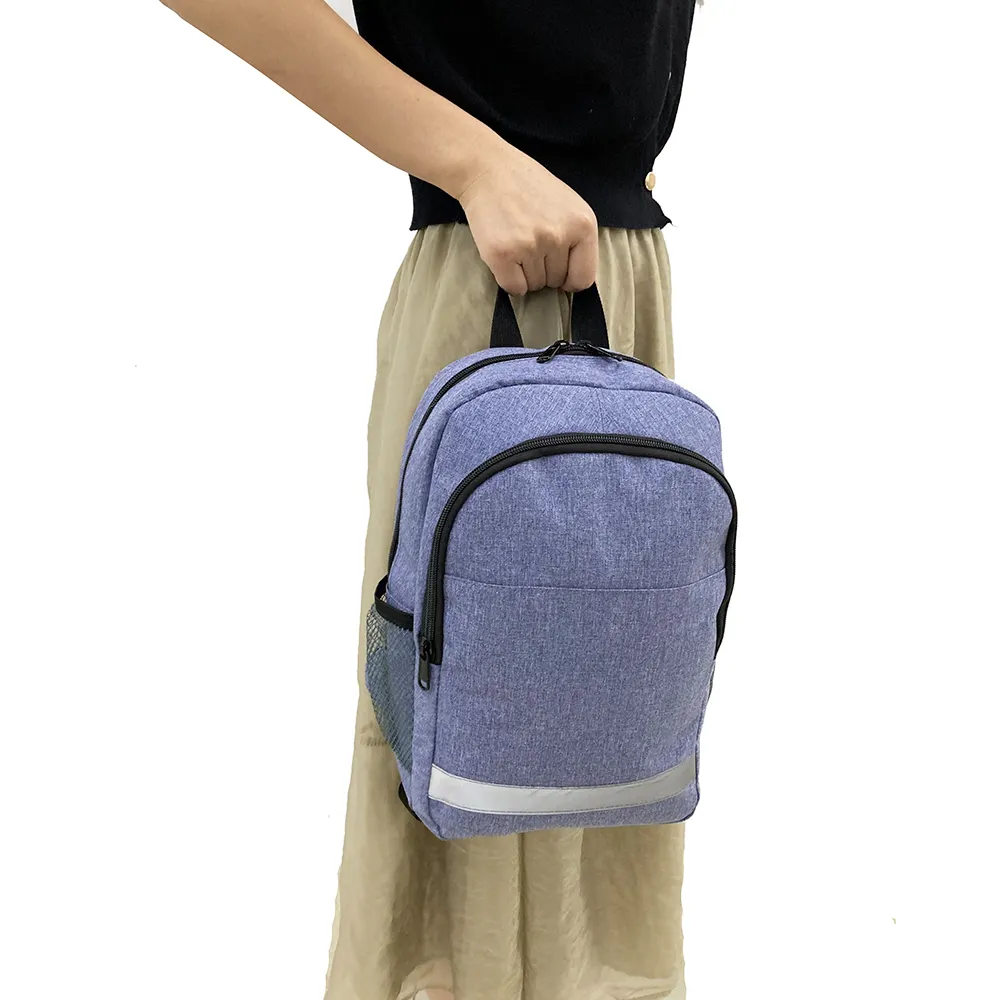 Mochilas escolares infantiles de poliéster de primera calidad al por mayor, mochilas escolares impermeables de gran tamaño para niños con correa reflectante