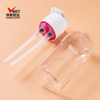 Bouteille de soin double compartiment gauche-droite pour lotion, shampoing et produits cutanés, avec double pompe, sérigraphiée sur mesure, en PET 600ml (300ml + 300ml)