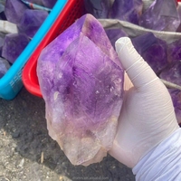 Vente en gros de cristaux bruts d'améthyste naturelle en forme de baguette pour la guérison des chakras, la décoration de la maison, la collection d'art, les cadeaux