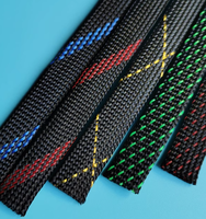 Manchon de tuyau en maille de peau de serpent rouge et noir Manchons de câble tressés en nylon PET écologique