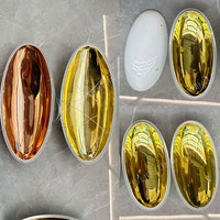 Lustre suspendu moderne personnalisé en verre en forme d'œuf pour plafond dans le hall d'un hôtel de luxe avec lumières décoratives de longue forme
