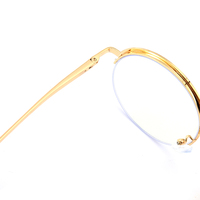 Lunettes personnalisées classiques en métal demi-cerclées en forme de S, montures optiques anti-lumière bleue au design solide pour toutes les formes de visage