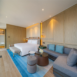 Ensemble de meubles de chambre d'hôtel 3 étoiles moderne à prix abordable : lit rembourré sur mesure, banquette, canapé en tissu, table basse, ottoman, panneau - Product Image 1