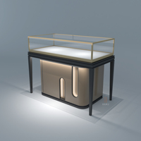 Comptoir de magasin de détail en or de luxe Présentoir design Meubles de bijouterie en verre Vitrines de bijouterie Lumières LED