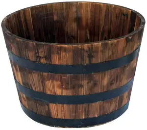 Burned barrel shaped wooden flower pot