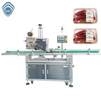Machine d'étiquetage automatique à grande vitesse SKILT pour l'étiquetage des plateaux de viande, des emballages en papier et en plastique, et des étiquettes de surface supérieure
