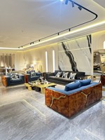 Canapé d'angle de style italien haut de gamme en acier inoxydable, léger, modulaire de luxe pour plusieurs personnes, ensemble de salon pour villa