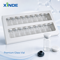 Flacons et bouteilles en verre pharmaceutique transparents XINDE pour gouttes oculaires avec impression sérigraphique, vides, avec plateaux et emballage en boîte