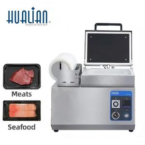 HVT-240TS Hualian alimentaire <span class=keywords><strong>carte</strong></span> plateau à emporter sous vide peau emballage scellant Machine <span class=keywords><strong>pour</strong></span> viande fraîche fruits de mer - Product Image 1