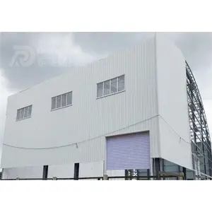 Entrepôt industriel préfabriqué à toiture incurvée structure en acier hangar d'atelier bâtiments