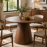 Table à manger ronde sur piétement conique massif, placage en bois de noyer, plateau fixe en MDF