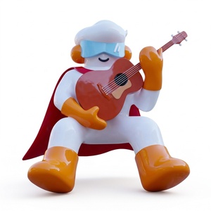 Statue en résine de dessin animé abstrait jouant de la guitare avec une cape rouge et des lunettes bleues, décoration d'intérieur, sculpture artistique - Product Image 1