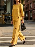 Ensemble décontracté femme 2026 : chemise en lin mélangé et pantalon large, tenue deux pièces boutonnée à ourlet irrégulier pour printemps-été