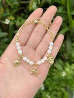 Bracelet tendance en cuivre plaqué or avec breloques papillon, croix et mini breloques émaillées, perles en verre transparent, vente en gros