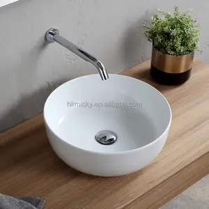 Lavabo-Lavabo de cerámica moderno para baño, Lavabo redondo de porcelana para hotel, encimera artística