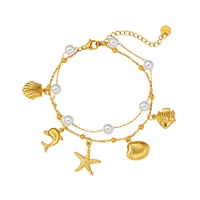 Bracelet double couche en acier inoxydable plaqué or 18 carats avec breloques océaniques, perle, étoile de mer, dauphin et coquillage, bracelet d'été pour femme