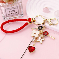 Porte-clés léger en alliage de zinc avec trèfle à quatre feuilles, pendentif de sac, anneau, cadeau pour femme, mode, mignon, strass