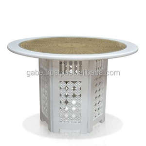 Moroccan Splendor 120cm <b>Dining</b> <b>Table</b> showcases handcrafted solid mahogany, intricate <b>rattan</b> webbing, and a sleek glass top - Product Image 3