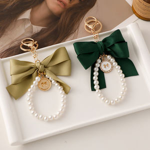 女性エレガントな甘いスタイル高級コインホルダーキーホルダーおしゃれピンクリボン真珠装飾クリエイティブ合金バッグチャームアクセサリー - Product Image 4